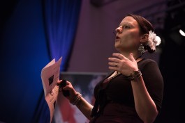 How Not - hands in the air, looking up